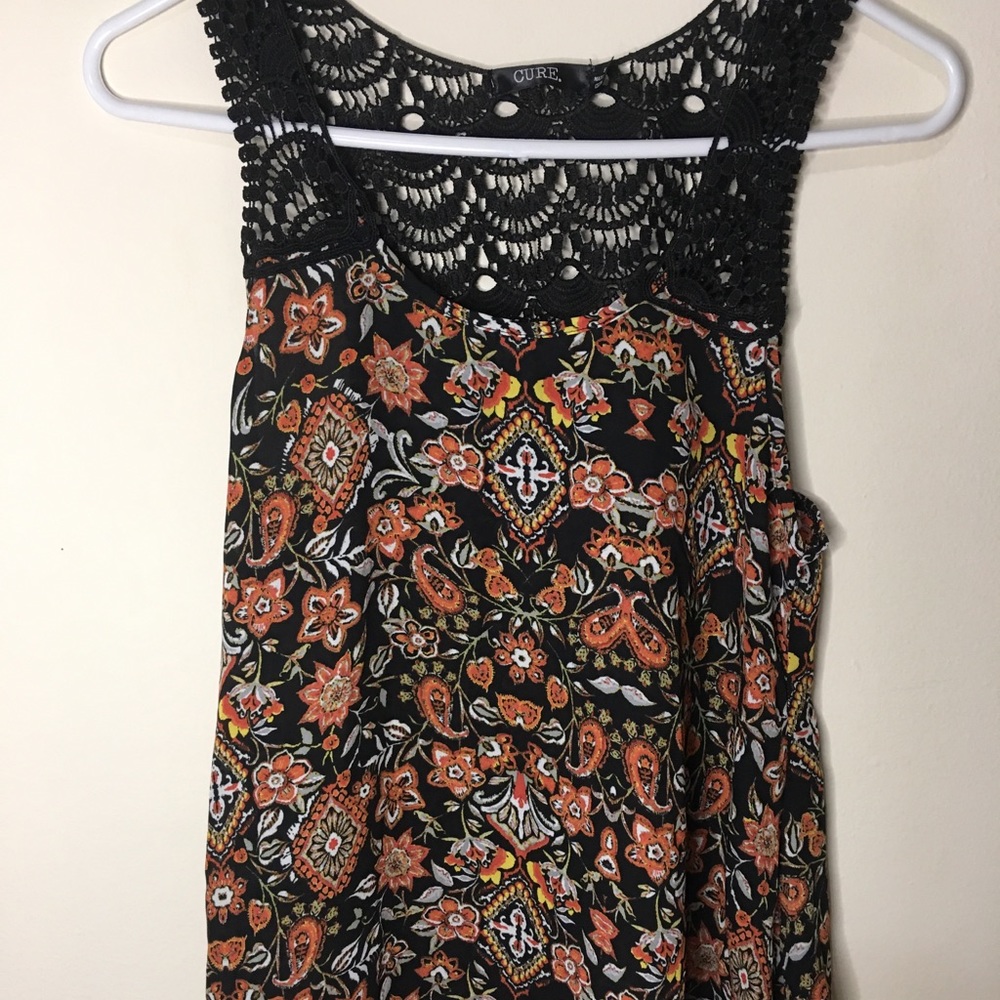 Cure tank top. First photo is the front of tank top.